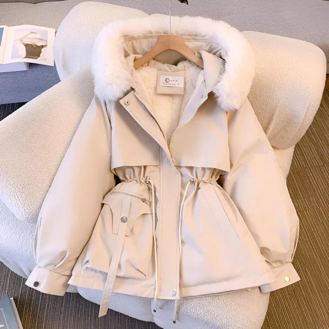 Elegant women's winter jacket, stylish & warm, perfect for cold weather. Insulated, chic outerwear.