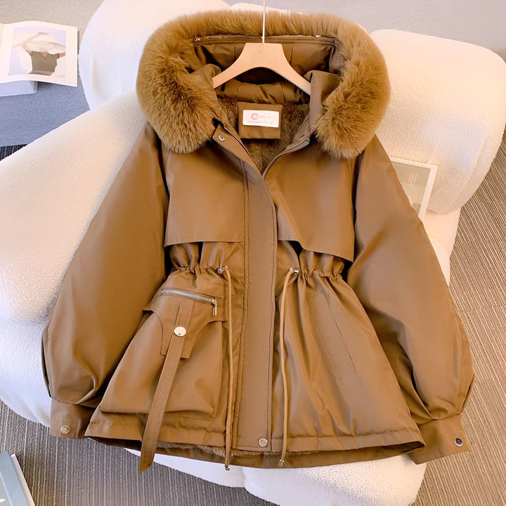Warm & stylish women's elegant winter jacket. Insulated, weatherproof coat for chic cold weather fashion.