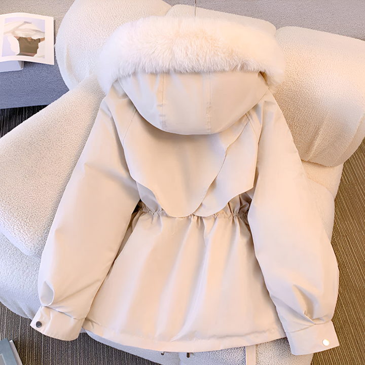 Stylish women's elegant winter jacket, warm, insulated, & weatherproof. Chic cold weather outerwear.