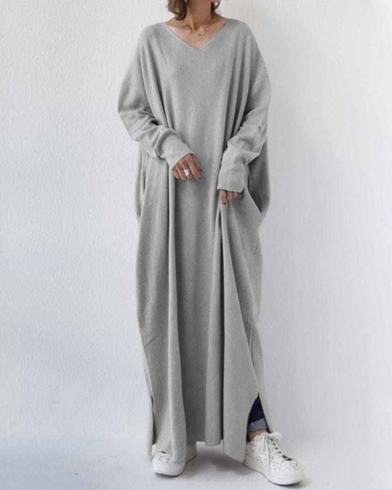 Elegant women's winter maxi dress with long sleeves, perfect for cold weather fashion and evening wear.