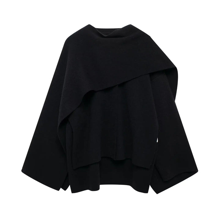 Warm women's winter poncho, stylish and practical for cold weather.
