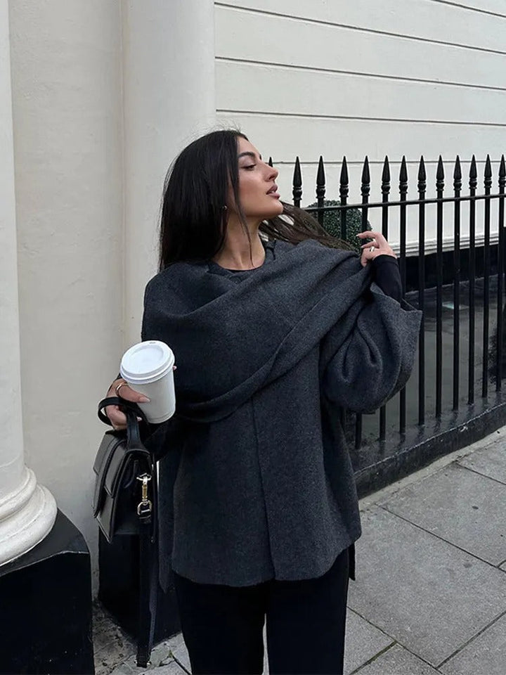 Chic women's winter wrap poncho, versatile layering for fall style.