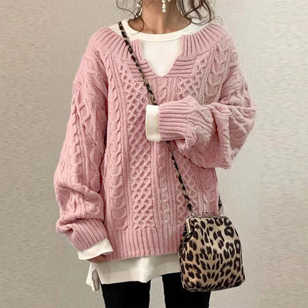 Warm women's twisted knit winter pullover. Cozy long sleeve sweater for elegant cold weather fashion.