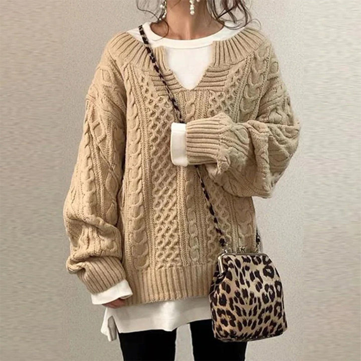 Cozy women's twisted knit sweater. Elegant long sleeve winter pullover, perfect for warm, comfortable style.
