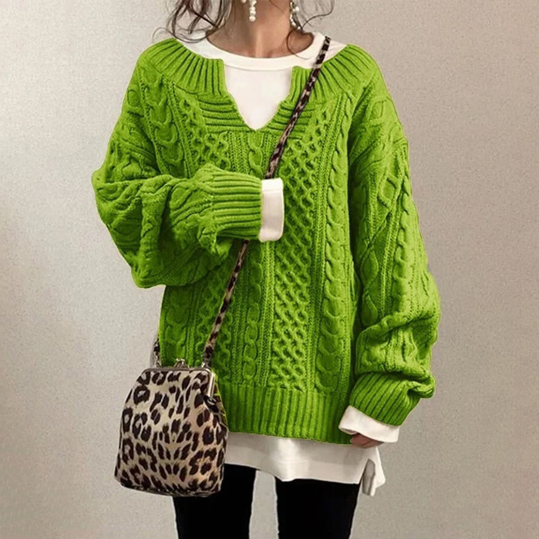 Women's elegant twisted knit winter sweater. Cozy long sleeve pullover, perfect for stylish cold weather.