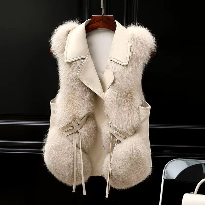 Elegant women's winter vest with oversized lapel, perfect for stylish layering outerwear. Warm & chic.