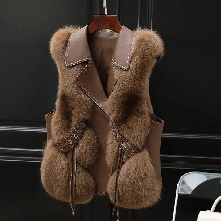 Fashionable women's elegant winter vest with oversized lapel, a stylish sleeveless outerwear piece.