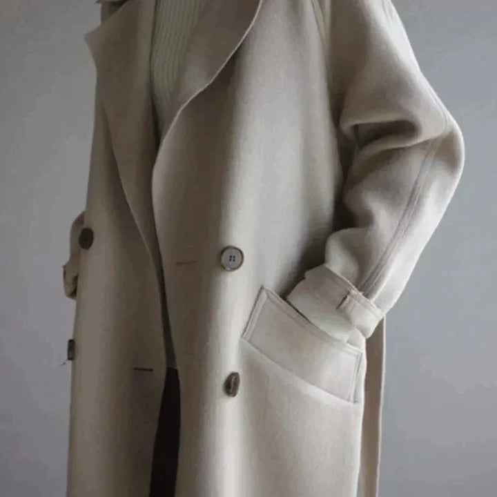 Sophisticated women's wool blend double-breasted long coat, a classic choice for autumn and winter