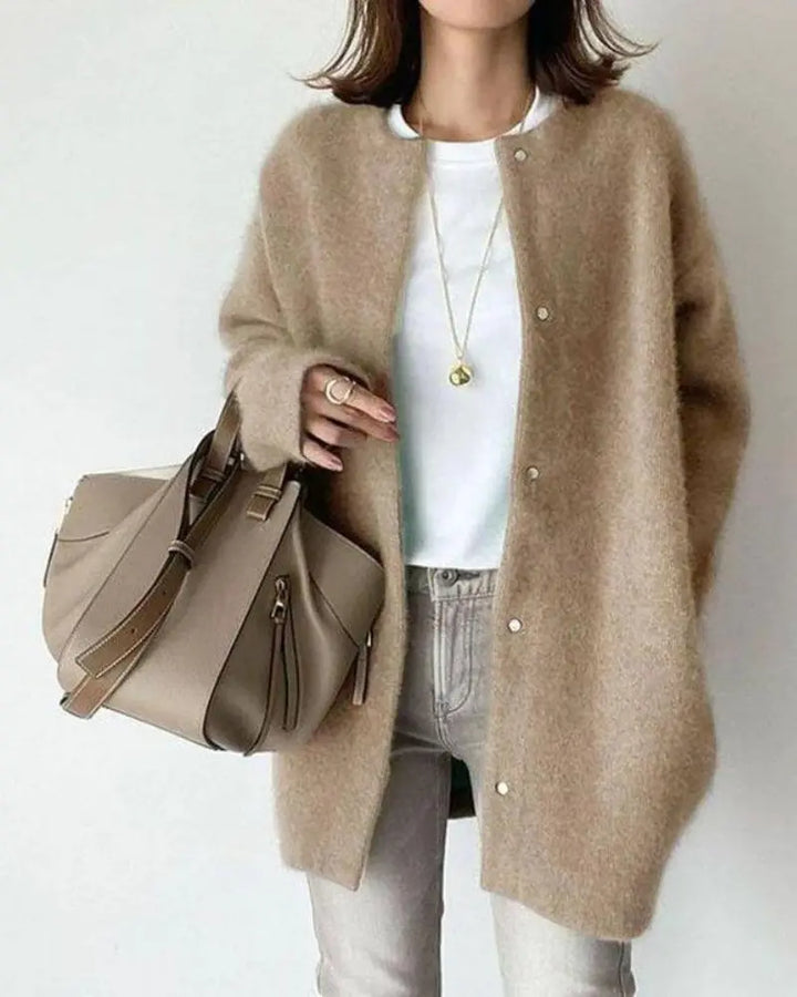 Elegant women's wool & mohair cardigan, cozy & versatile for fall/winter layering.