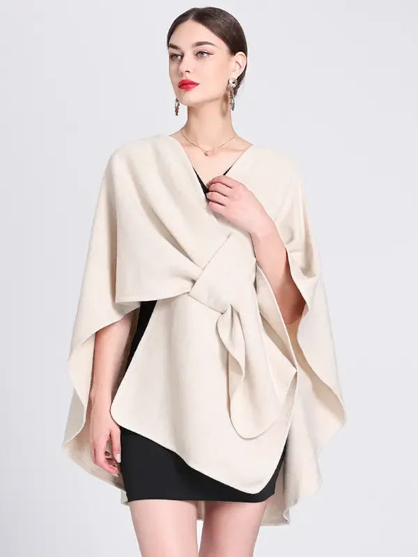 Elegant women's wrap cape top. Chic modern blouse, perfect for versatile fashion, workwear or smart casual outfits.