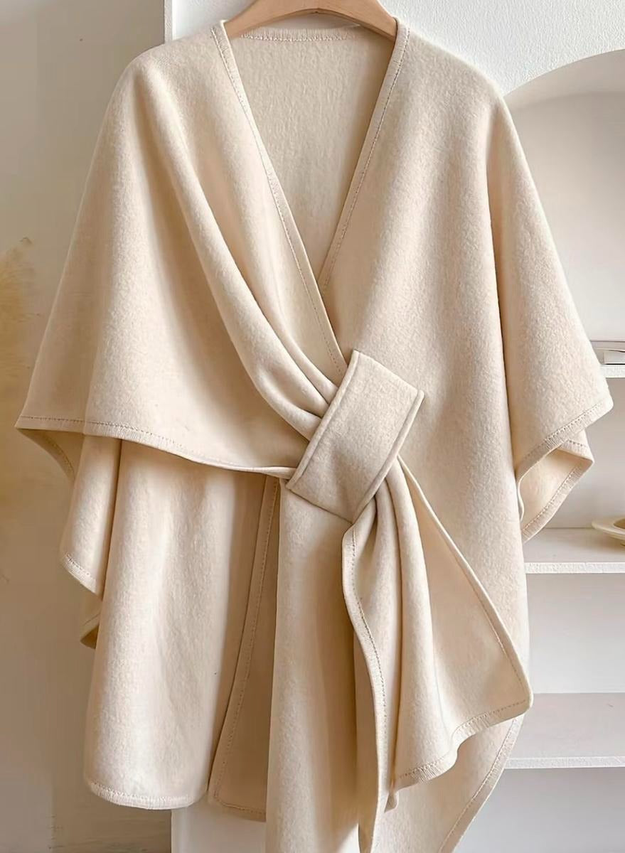 Fashionable women's wrap cape top. Modern elegant blouse for a sophisticated workwear & smart casual look.