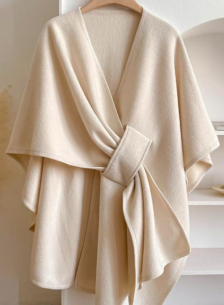 Fashionable women's wrap cape top. Modern elegant blouse for a sophisticated workwear & smart casual look.