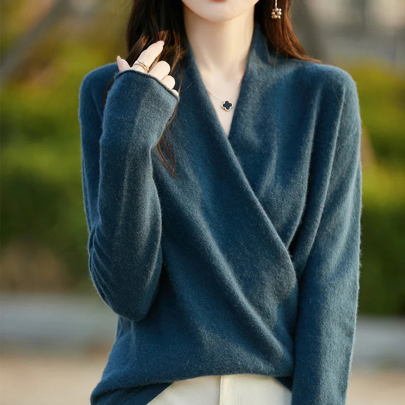 Elegant women's wrap sweater with a flattering V-neck, perfect for sophisticated layered fashion.