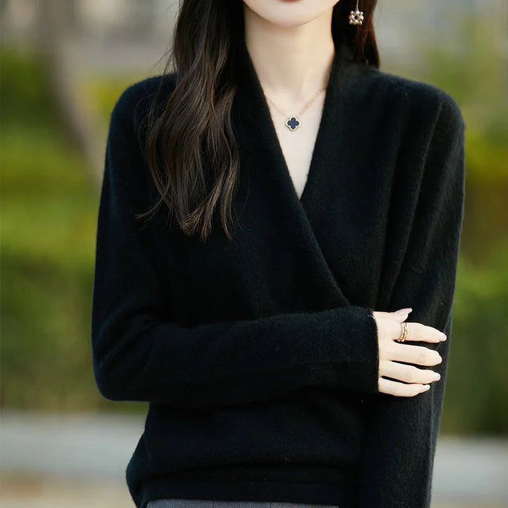Stylish women's wrap sweater, providing an elegant V-neck and versatile comfort for any occasion.