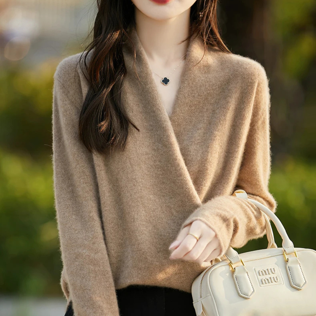 Women's elegant wrap top, a versatile V-neck sweater for comfortable and stylish layered outfits.