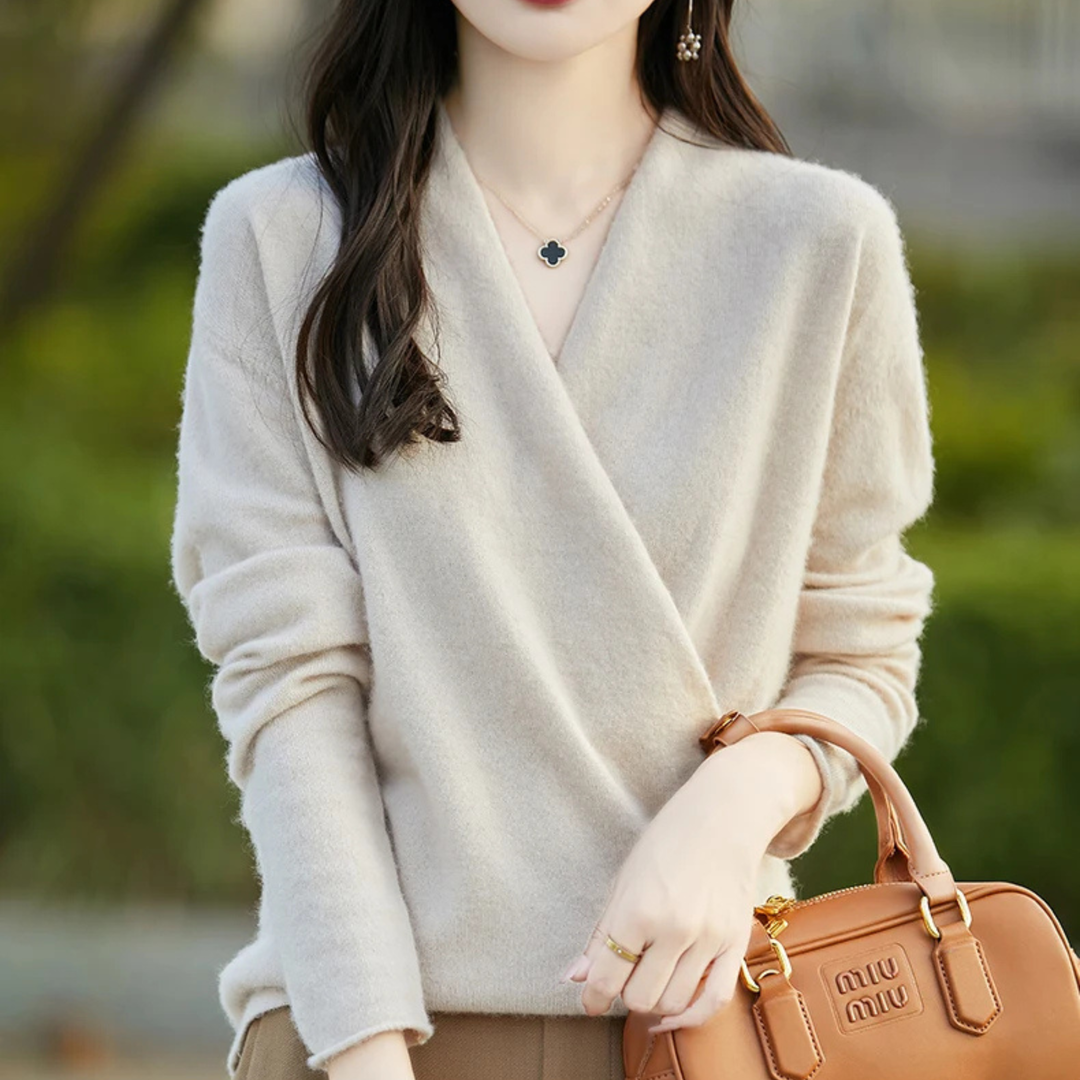 Fashionable women's V-neck wrap sweater, bringing sophistication to any comfort wear outfit.