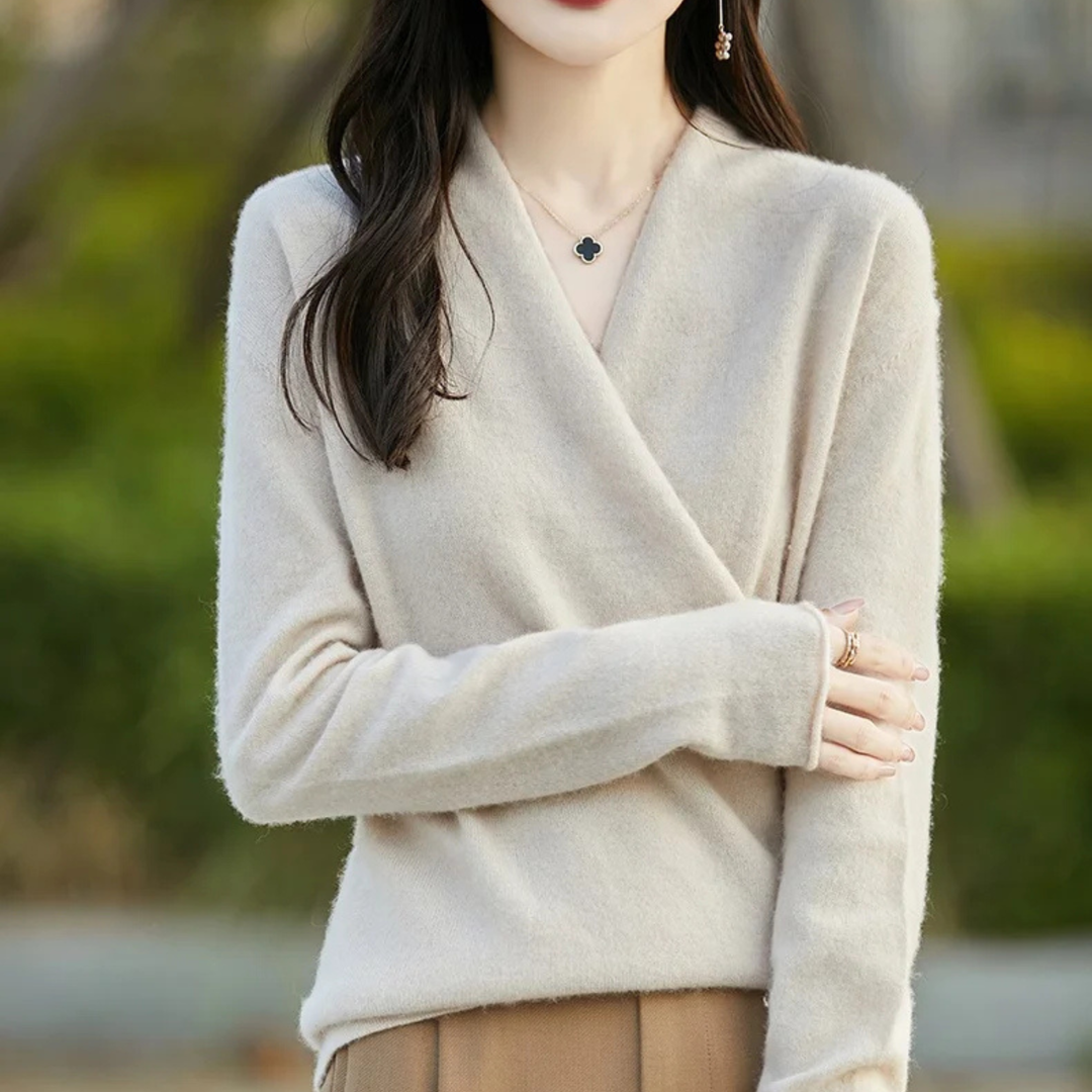 Women's elegant wrap sweater with a V-neck, offering a stylish and comfortable layering option.