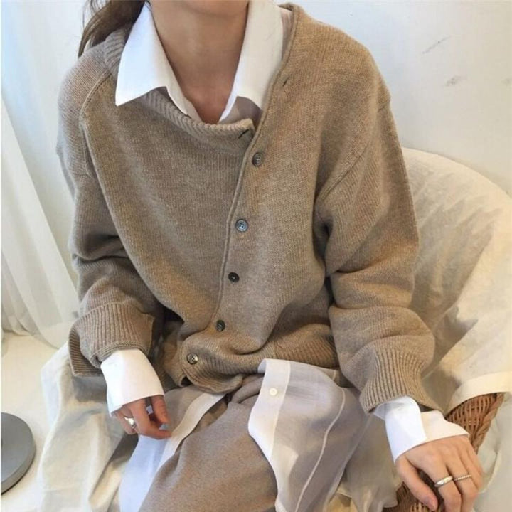Cozy Aurora cashmere blend wrap vest for women, featuring stylish button accents and a comfortable fit.