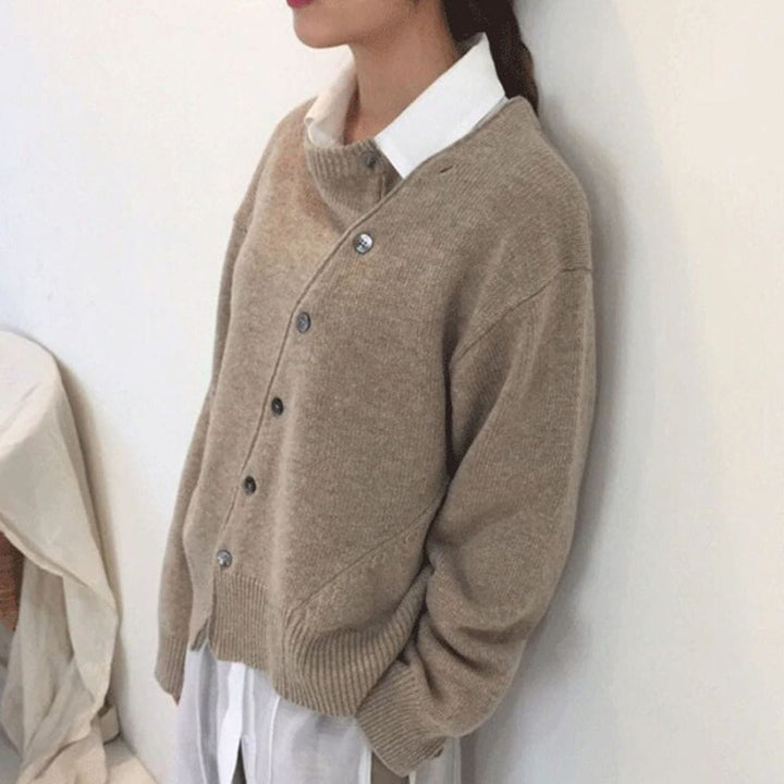 Chic women's button detail vest in a luxurious wrap style, ideal for versatile fall and winter layering.