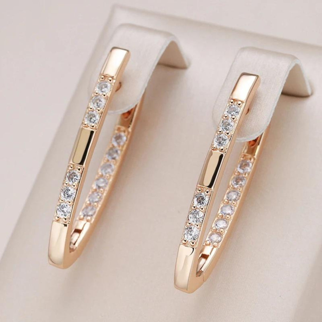Hypoallergenic silver zirconia stud earrings for women, adding sophisticated sparkle to any outfit.