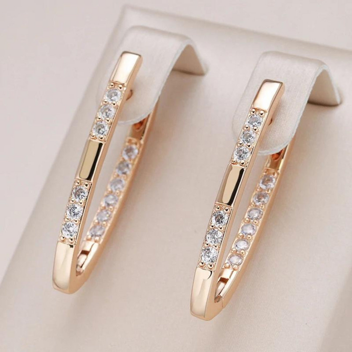 Hypoallergenic silver zirconia stud earrings for women, adding sophisticated sparkle to any outfit.