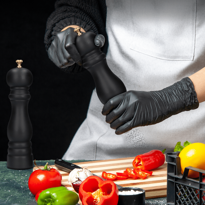 Premium wood and ceramic salt & pepper mill set. Spice grinders for easy seasoning, essential luxury kitchen tools.