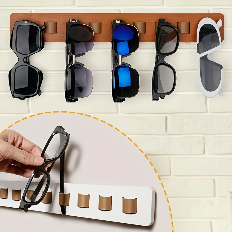Elegant wooden wall-mounted display rack for organizing sunglasses and eyeglasses.
