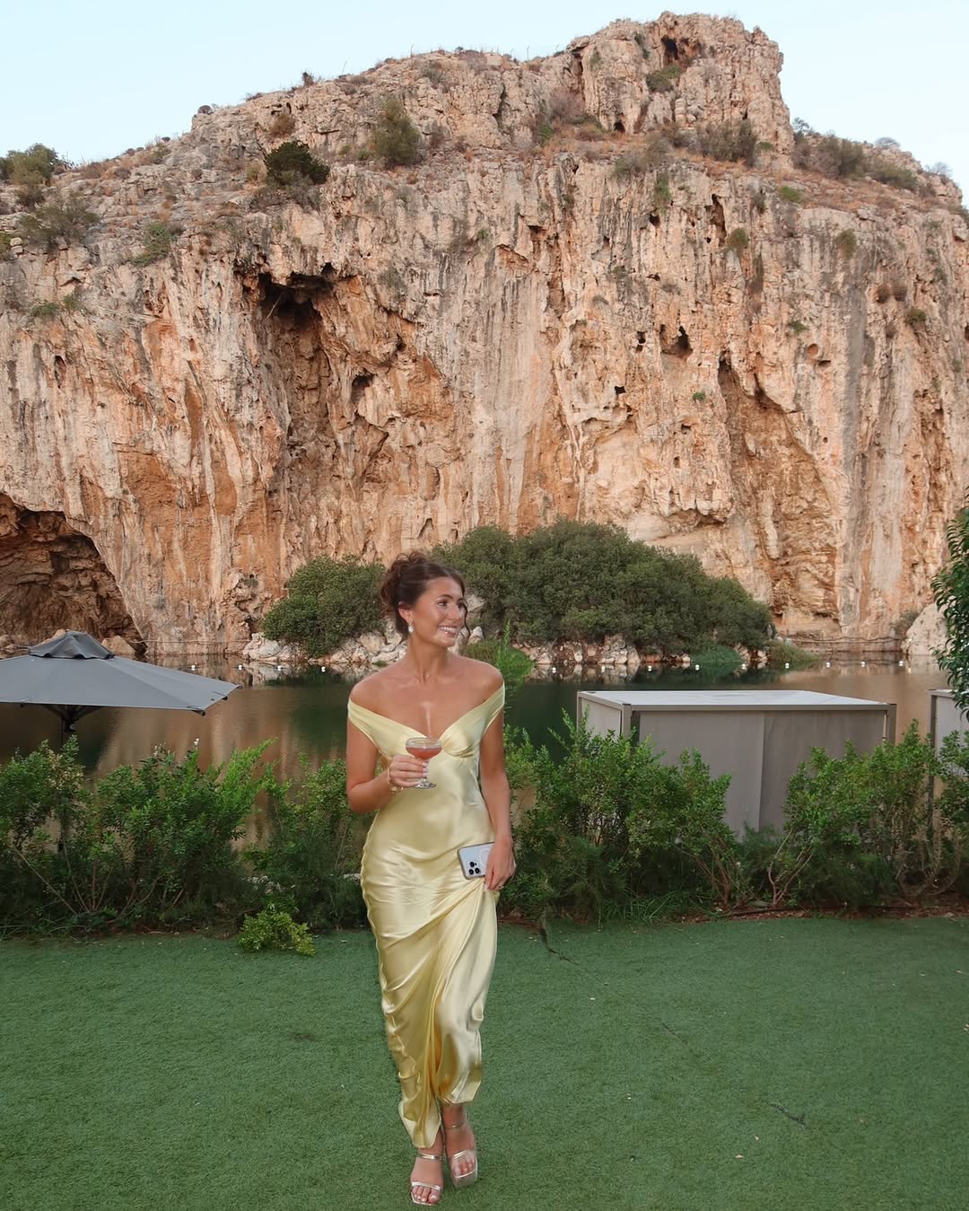 Fashionable women's yellow off-shoulder maxi dress. Elegant wedding guest formal dress with sweetheart neckline.