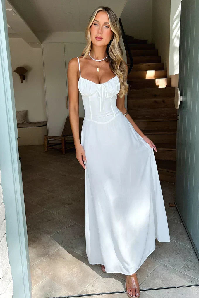 Women's formal wedding guest maxi dress, corset bodice, sweetheart neckline, bias cut for an elegant look.