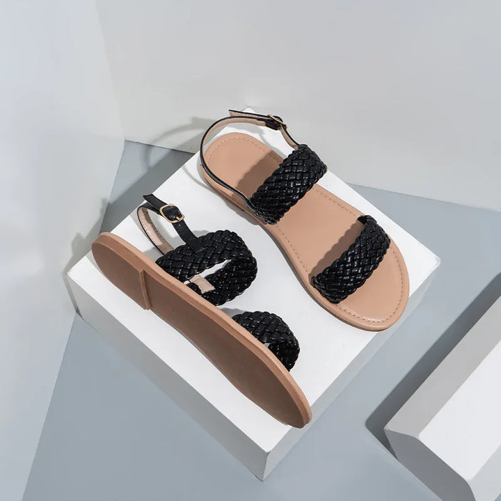 Close-up of Elina women's flat summer sandals with intricate strap detail and durable non-slip sole.