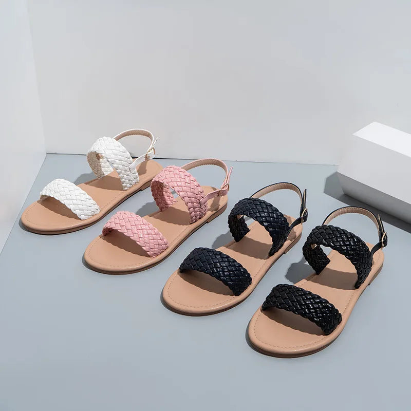 Stylish Elina flat summer sandals for women, designed with comfortable vegan leather for beachwear.