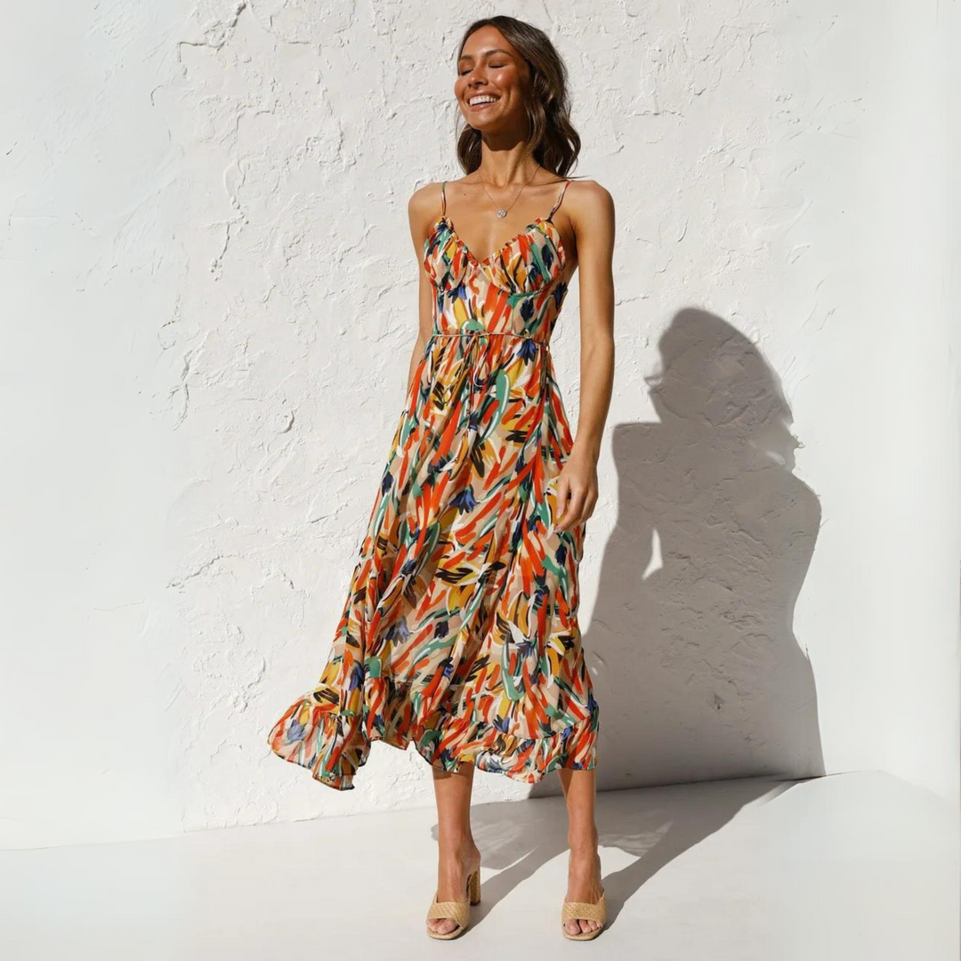 Back view of Elora women's printed summer dress, showcasing its elegant backless detail