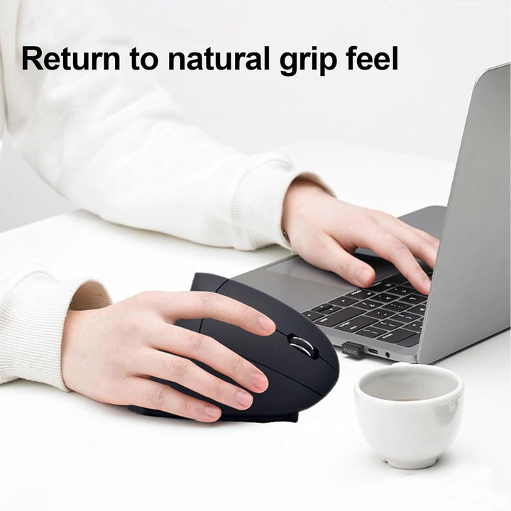 Elvion ergonomic vertical mouse, silver, showing the comfortable handshake grip for reduced wrist strain.