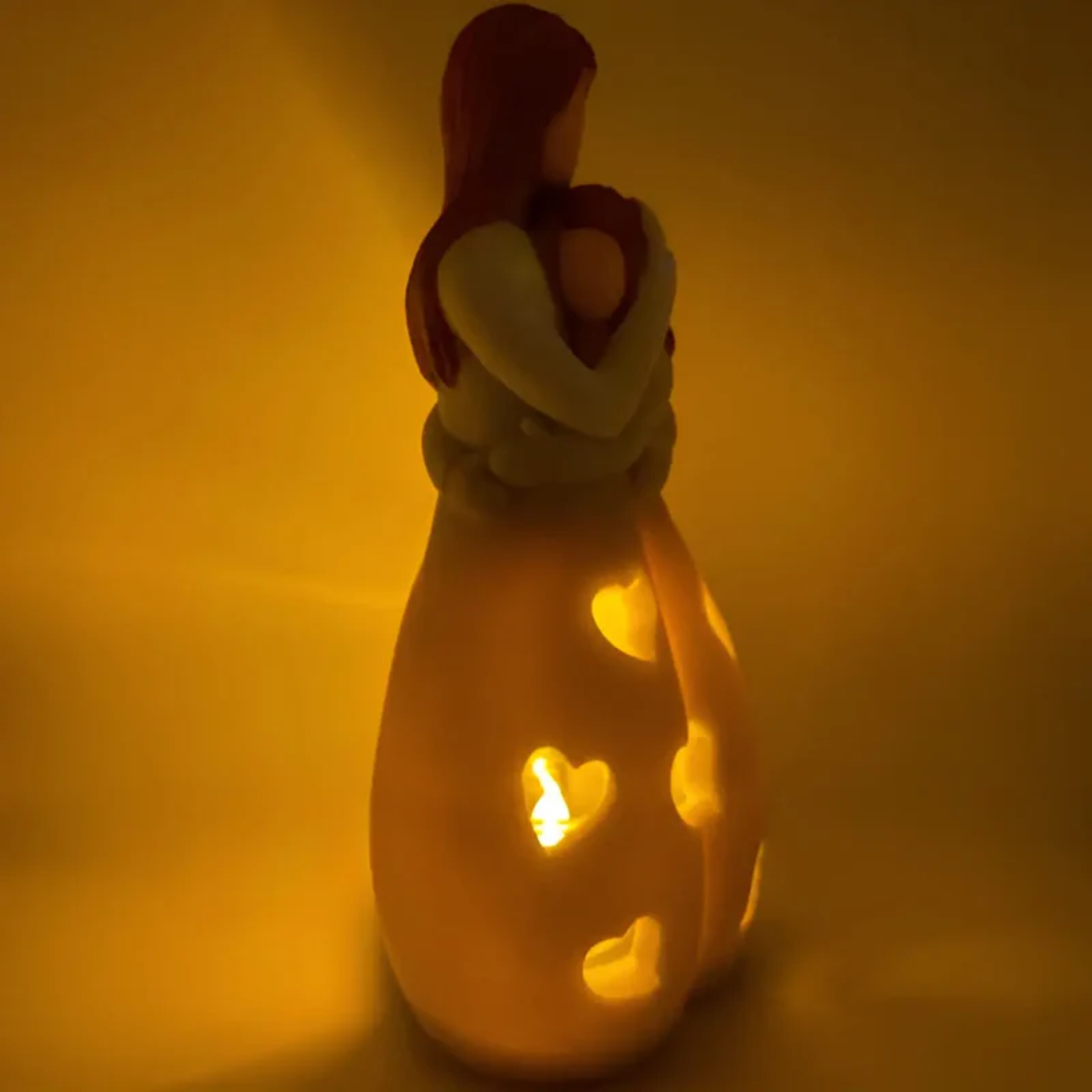 Sentimental embracing mother & daughter candle holder, ideal family love homedecor & emotional gift.