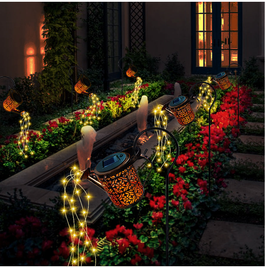 Decorative solar garden lamp with unique LED star shower waterfall effect, ideal for patio and outdoor decor.
