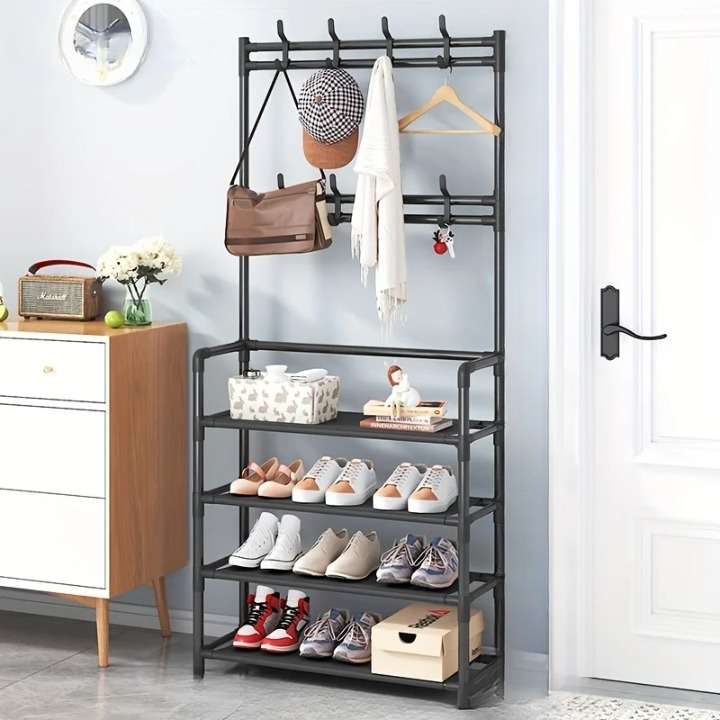Close-up of steel frame coat rack with multiple shelves for shoe storage & coats