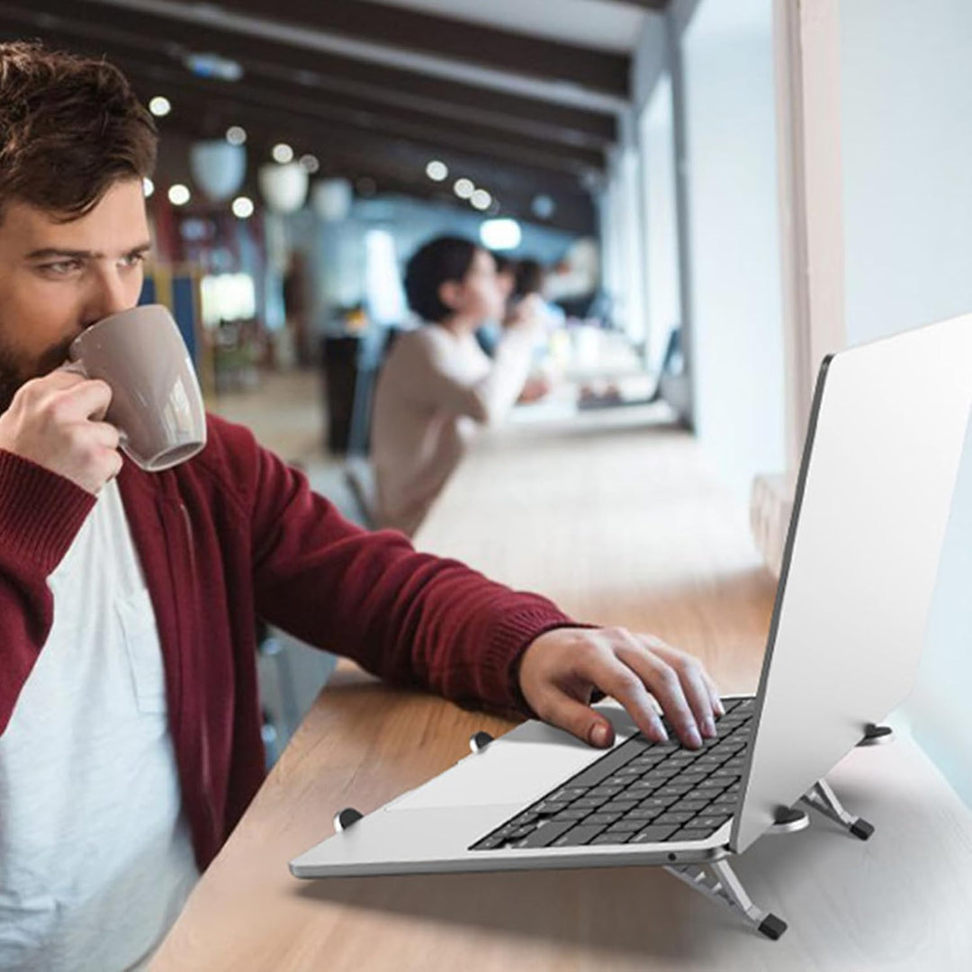 Foldable notebook mount, adjustable height & angle, promoting airflow for laptop cooling on desk