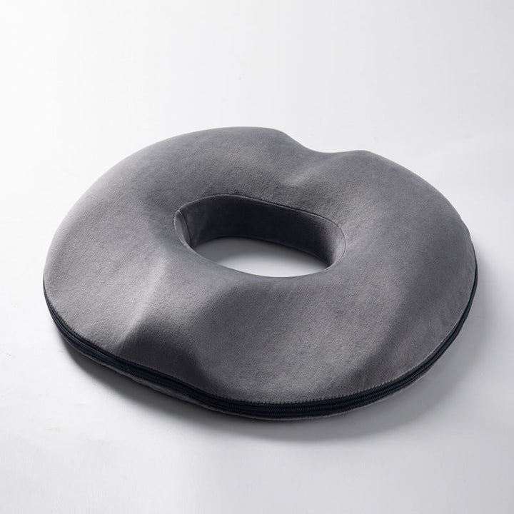 Ergonomic donut cushion for tailbone & coccyx pain. Premium memory foam for ultimate comfort.