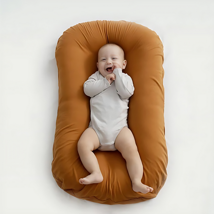 Soft baby pillow for newborns, offering head support & healthy sleep. Ideal for cribs, strollers & bassinets. Hypoallergenic.