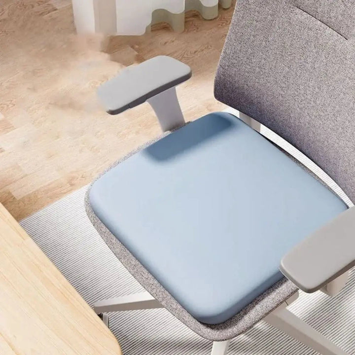 Ergonomic home accessory: non-slip seat cushion improving posture and comfort for any chair.
