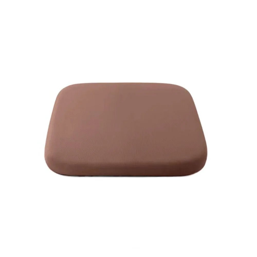 Multi-purpose ergonomic non-slip cushion, promoting good posture, comfort, and pain relief.