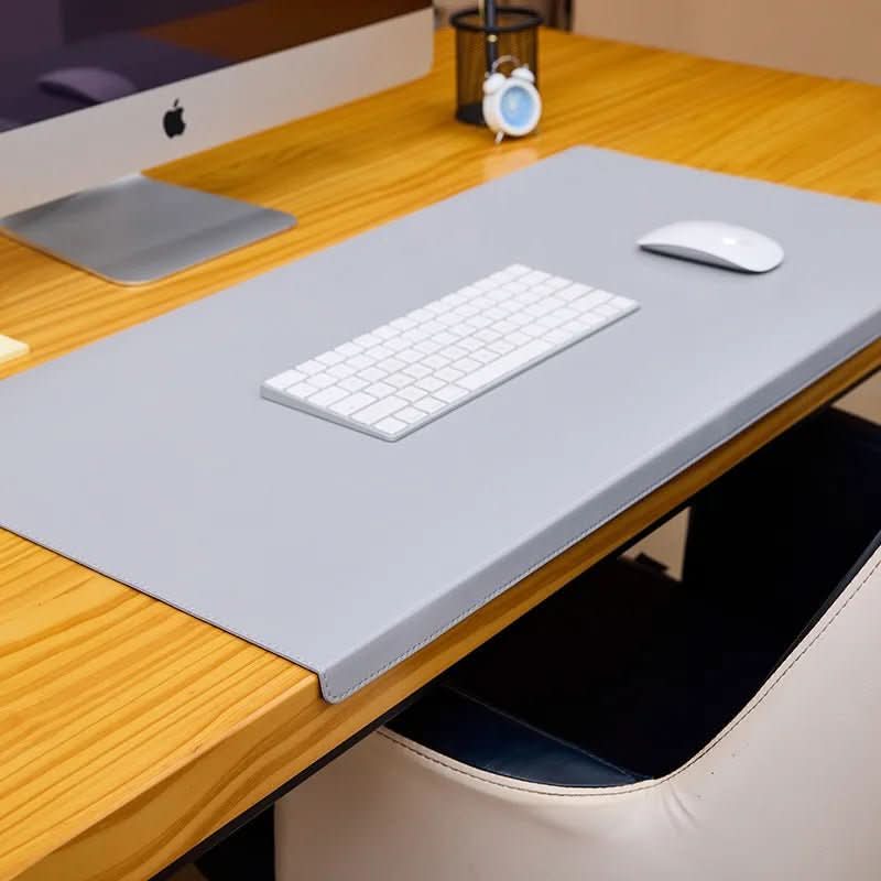 Versatile ergonomic PU leather desk mat with comfortable wrist support, a must-have office accessory.