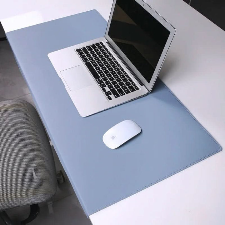 Protective & ergonomic PU leather desk mat, wrist support for a healthy and efficient workspace.