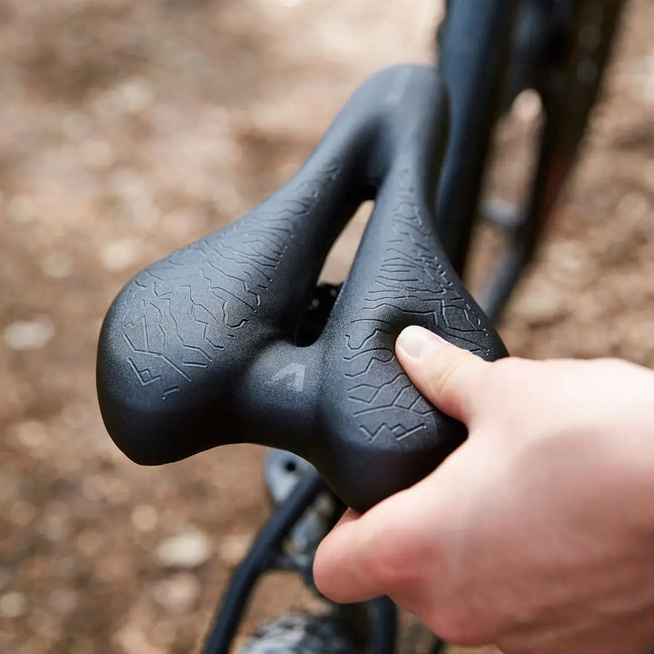 SaddlePeak AirRide ergonomic bicycle seat for mountain, road, and e-bikes, featuring plush memory foam.