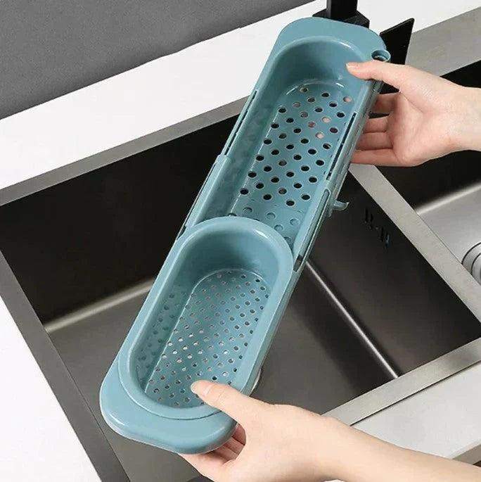 Expandable kitchen sink organizer rack with dish drying space, sponge holder, and brush storage for tidy sinks.