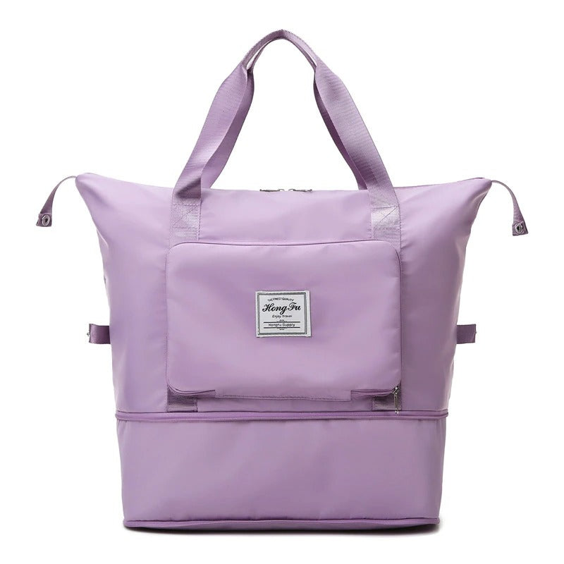 Weekender waterproof travel bag with spacious interior, packed with clothes, shoes, and toiletries