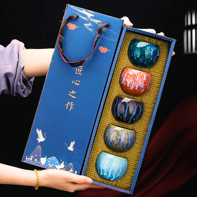 Exquisite Dragon Eggs Teacup Set with 6 porcelain teacups & pot, perfect for an elegant Asian tea ceremony.