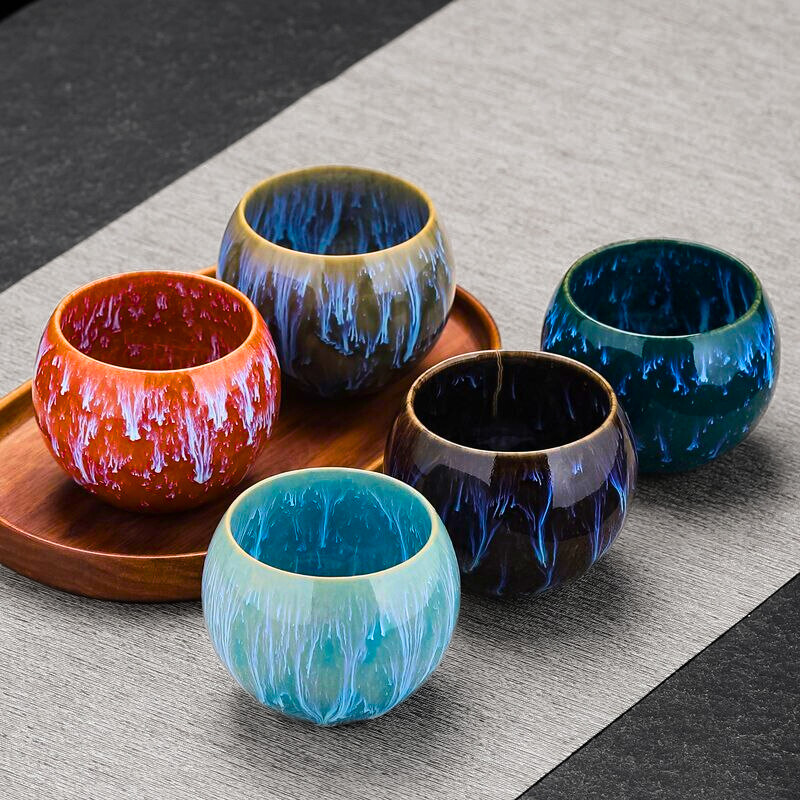 Asian-inspired Dragon Eggs porcelain teacup set arranged for a traditional tea ceremony, a cultural gift idea.