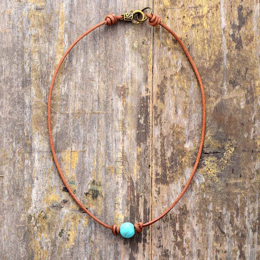 Exquisite handmade turquoise choker necklace for women, a vibrant boho chic fashion accessory with natural gemstones.
