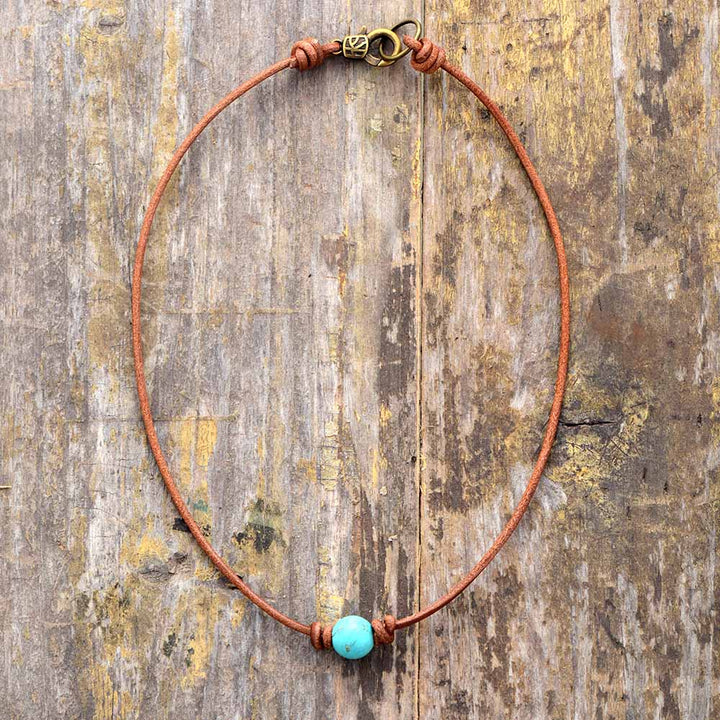 Exquisite handmade turquoise choker necklace for women, a vibrant boho chic fashion accessory with natural gemstones.